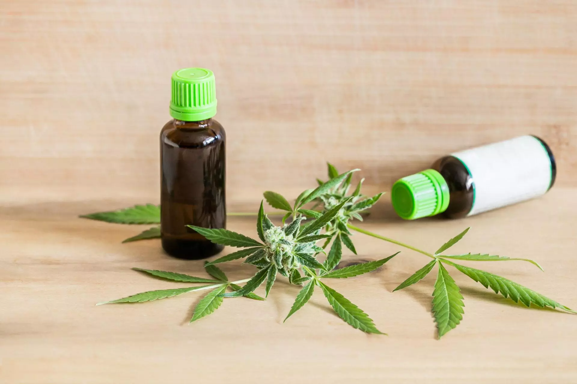 Medical cannabis oil in a bottle with a blank white label.